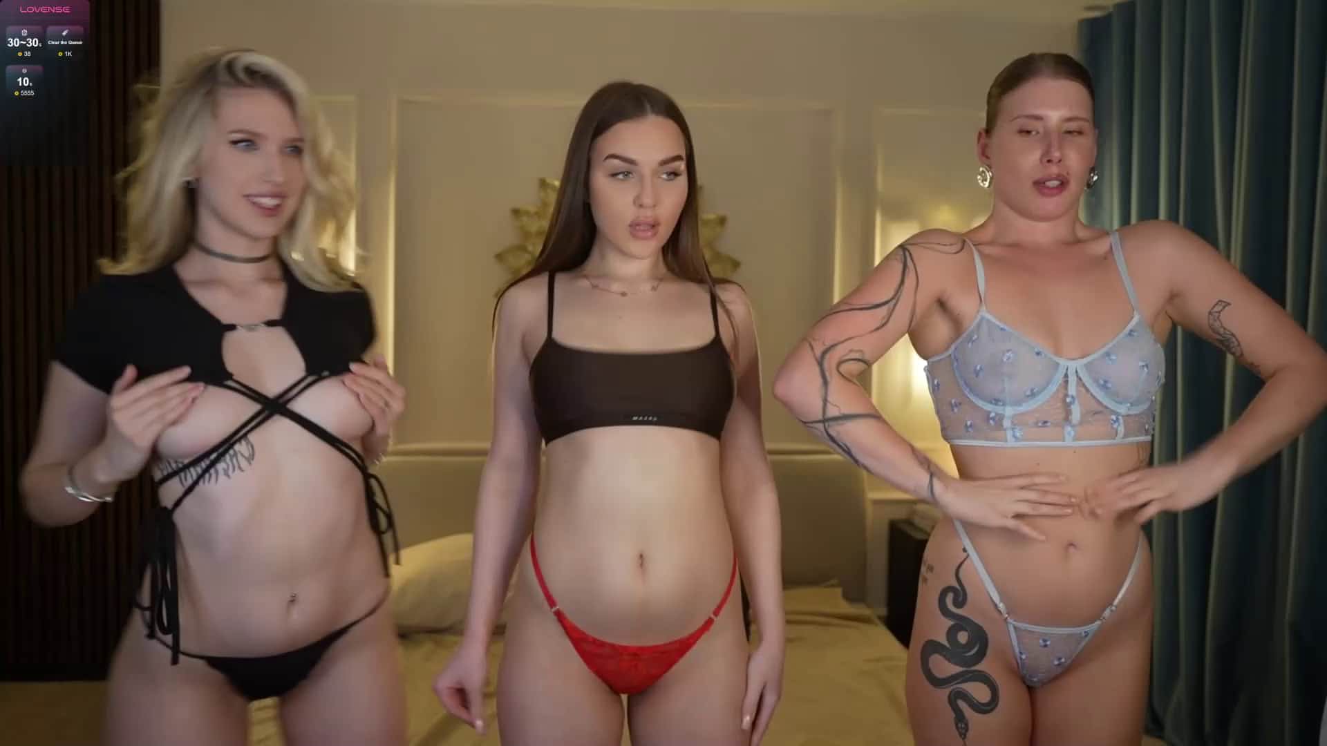 Steamy three-way action with brunette babes in thongs and white bras!